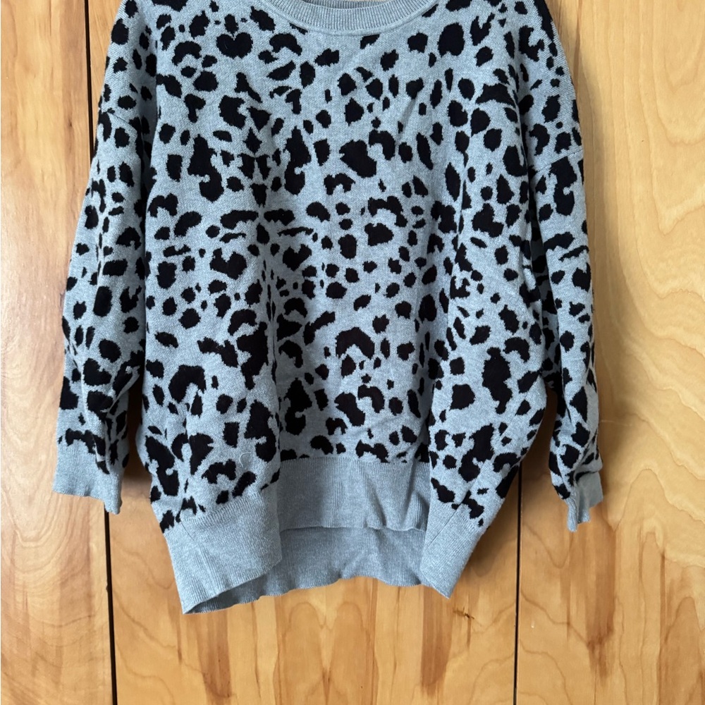 Elegant Gray and Black Animal Print Sweater